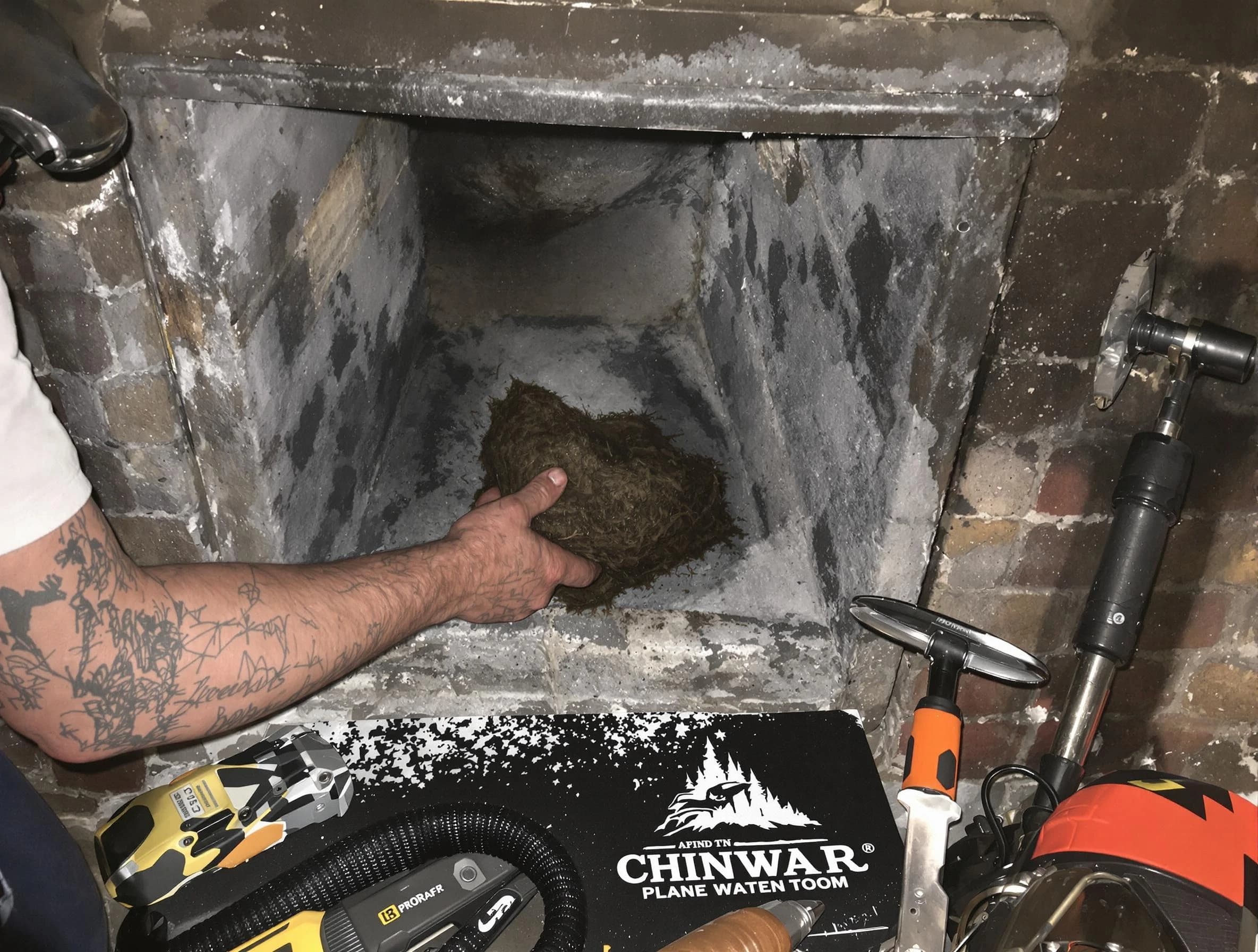 Lake View Chimney Sweep safely removing debris and screening chimney in Lake View, AL
